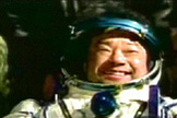 ISS Expedition 10 commander Leroy Chiao smiles widely after landing back on Earth aboard a Soyuz TMA-5 spacecraft on April 24, 2005.