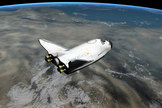 An artist's interpretation of the Dream Chaser vehicle after spacecraft separation.