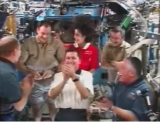American Billionaire, Astronauts Share Smiles Aboard Space Station
