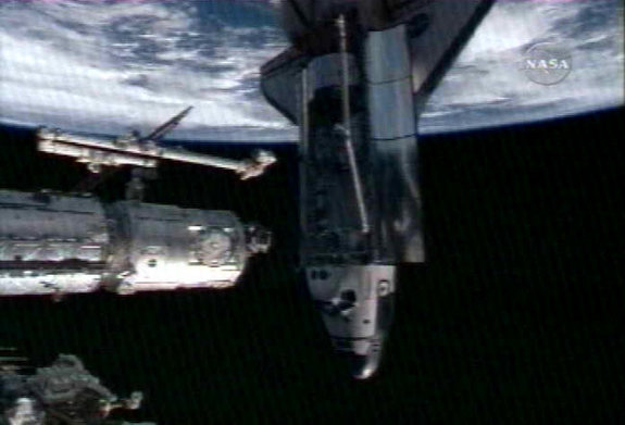 The space shuttle Endeavour arrives at the International Space Station on March 12, 2008 during NASA's STS-123 mission.