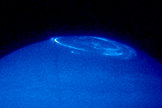 Hubble Space Telescope ultraviolet image of the northern pole of Jupiter. Among many other auroral structures, the Io footprint is the most equator-ward feature close to the centre of the image. This spot is always located close to the feet of the magnetic field lines connected to the satellite Io.