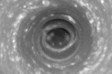 Cassini stares deep into the swirling hurricane-like vortex at Saturn's south pole, where the vertical structure of the clouds is highlighted by shadows. Such a storm, with a well-developed eye ringed by towering clouds, is a phenomenon never before seen on another planet.