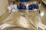 The Huntsville-based NanoSail-D team stands with the fully deployed sail at ManTech SRS technologies on April 16, 2008, after the successful deployment test.