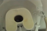 The "positional trainer" space toilet is for practice only, as it does not function. Hole diameter = 4 inches.