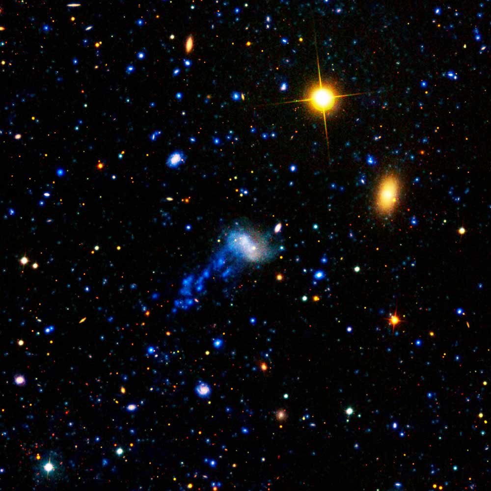 Cosmic Hit-and-Run Gives Galaxy Starry Tail