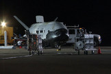 The U.S. Air Force's secretive X-37B robot space plane landed at Vandenberg Air Force Base in California on Dec. 3, 2010 to end a successful — but mysterious — seven month mission that was shrouded in secrecy. Recovery crews were quick on scene to meet the space drone.