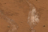 The Spirit rover's jammed right front wheel dug this trench, exposing silica minerals -- strong evidence of hydrothermal activity in Mars' ancient past.