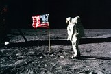 Apollo 11 astronaut Buzz Aldrin stands on the lunar surface during the first moon landing in 1969.
