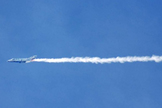 Virgin Galactic's first SpaceShipTwo passenger spacecraft leaves contrails in its wake during a Jan. 13, 2011, glide test, the fourth in a series of demonstration flights.