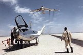 This classic 1969 photo shows the Dryden NB-52B flying over the HL-10 lifting body aircraft and its pilot, Bill Dana.