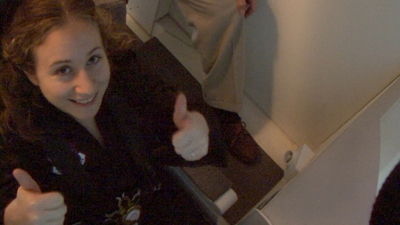 After a couple of practice sessions I was raring to go for the full-on flight profile of SpaceShipOne, which NASTAR uses for practice until data for Virgin Galactic's new SpaceShipTwo is available. Here, I'd just strapped into the cockpit. — Clara Moskowitz.