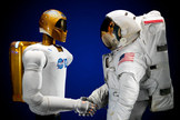 The space shuttle Discovery delivered a humanoid robot helper called Robonaut 2 to the International Space Station.