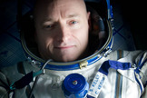 Expedition 26 Commander Scott Kelly wears a blue wrist band that has a peace symbol, a heart and the word "Gabby" to show his love of his sister-in-law U.S. Rep. Gabrielle Giffords as he rests shortly after he and cosmonauts Oleg Skripochka and Alexander Kaleri landed in their Soyuz TMA-01M capsule in Kazakhstan on March 16, 2011.