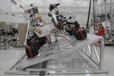 The image shows Curiosity on a tilt table in the Spacecraft Assembly Facility at NASA's Jet Propulsion Laboratory, Pasadena, California.