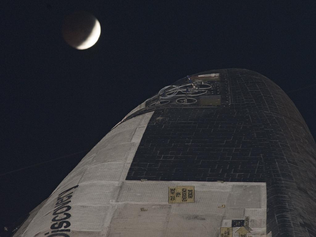 Shuttle Discovery and the Lunar Eclipse