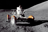 Apollo 17 mission commander Eugene A. Cernan makes a short checkout of the Lunar Roving Vehicle during the early part of the first Apollo 17 extravehicular activity at the Taurus-Littrow landing site in 1972.