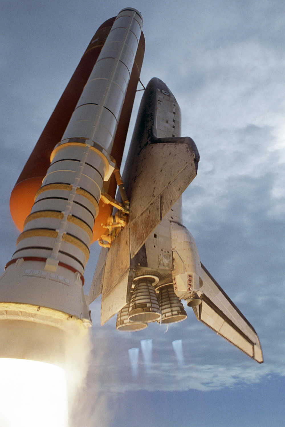 Discovery Roaring Through Clouds