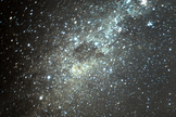 The dark Coalsack is readily apparent in the middle of the image. The stars Alpha Centauri (the closest star to our solar system at 4.3-light years away) and Beta Century are to the left of the Coalsack, while the famous Southern Cross (Crux) is poised just above and to the right of the Coalsack. The Southern Milky Way is far more spectacular than the Milky Way that those of us situated north of the equator can ever see. Taken from La Serena, Chile on April 6, 1986.
