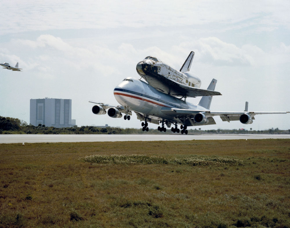 Columbia Lands with T-38 Chase Plane Visible