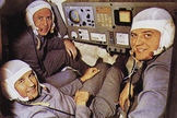 Soyuz 11 cosmonauts Viktor Patsayev, Georgi Dobrovolsky, and Vladislav Volkov are shown in a flight simulator in this photo.