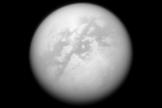 NASA's Cassini spacecraft peers through the murk of Titan's thick atmosphere in this view, taken with Cassini's narrow-angle camera on Sept. 25, 2008.