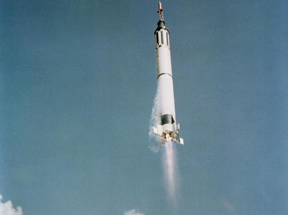 In this view, the Mercury-Redstone 3 (MR-3) spacecraft carrying Alan Shepard in Freedom 7 is already headed towards its suborbital maneuver, shortly after lifting off from Cape Canaveral in Florida.
