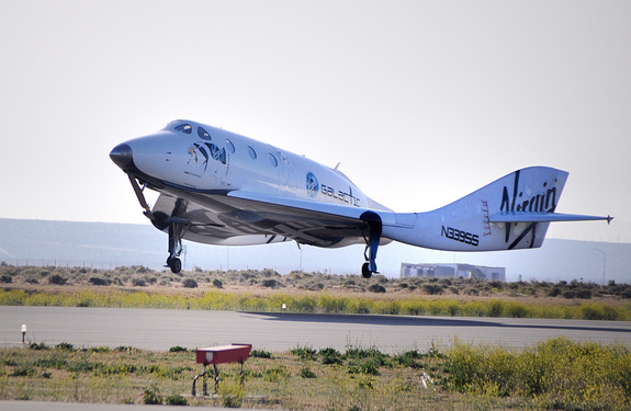SpaceShipTwo makes a May 4, 2011 landing on Runway 30 at the Mojave Air and Space Port in California. Touch down signaled the successful end to the craft's 7th glide test and, for the first time, evaluation of its novel feather re-entry system.