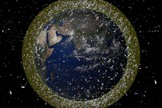 This computer illustration depicts the density of space junk around Earth in low-Earth orbit.