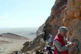 Looking for trilobites and other ancient marine fossils on a mud mound in Morocco.