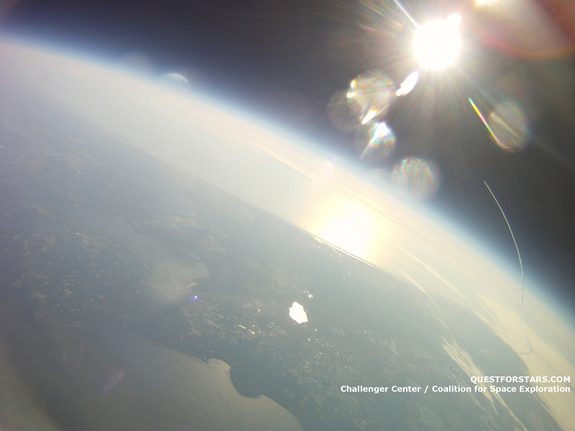 This picture, taken at an altitude of about 64,000 feet by a balloon launched as part of a student project, shows NASA's space shuttle Endeavour streaking toward space on its final STS-134 mission.