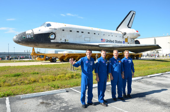 The crew of STS-135, NASA's final mission for its space shuttle program, pose in front of their spacecraft, space shuttle Atlantis on May 17, 2011. From left to right: mission specialist Rex Walheim, commander Chris Ferguson, pilot Doug Hurley and mission specialist Sandra Magnus.