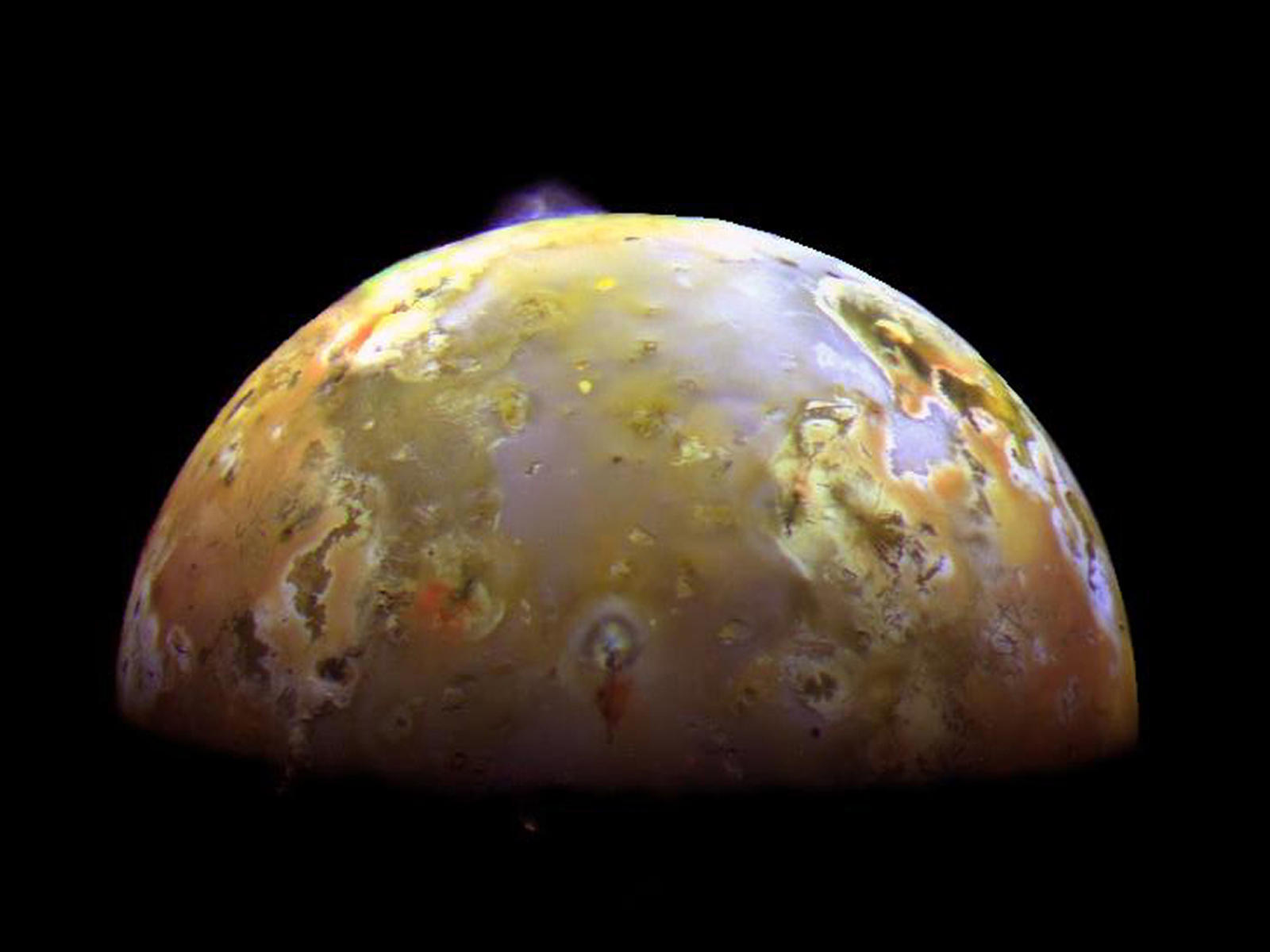 Two sulfurous eruptions are visible on Jupiter's volcanic moon Io.