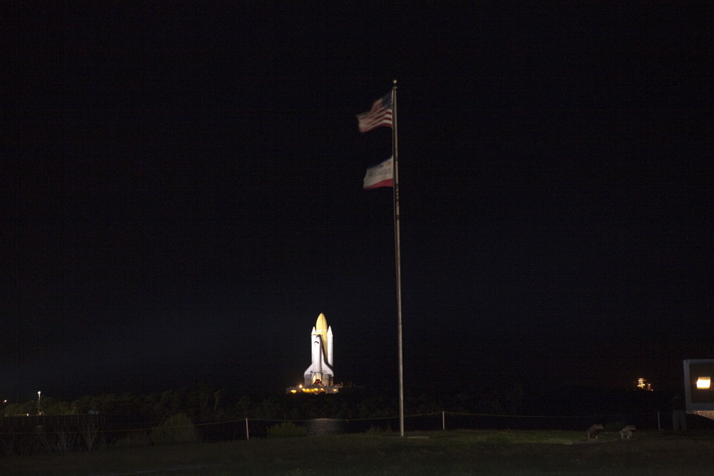 Atlantis Rolls Out by Flags