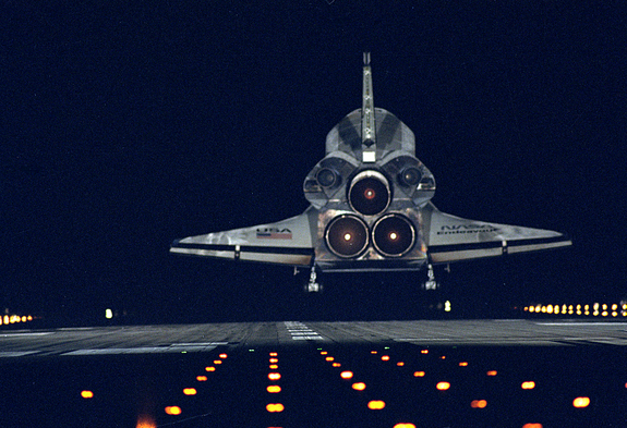 The space shuttle Endeavour glides back to Earth on Jan. 20, 1996, after nine days in space on the STS-72 mission. The orbiter is about to touch down on Runway 15 at the Shuttle Landing Facility at NASA's Kennedy Space Center in Cape Canaveral, Fla.
