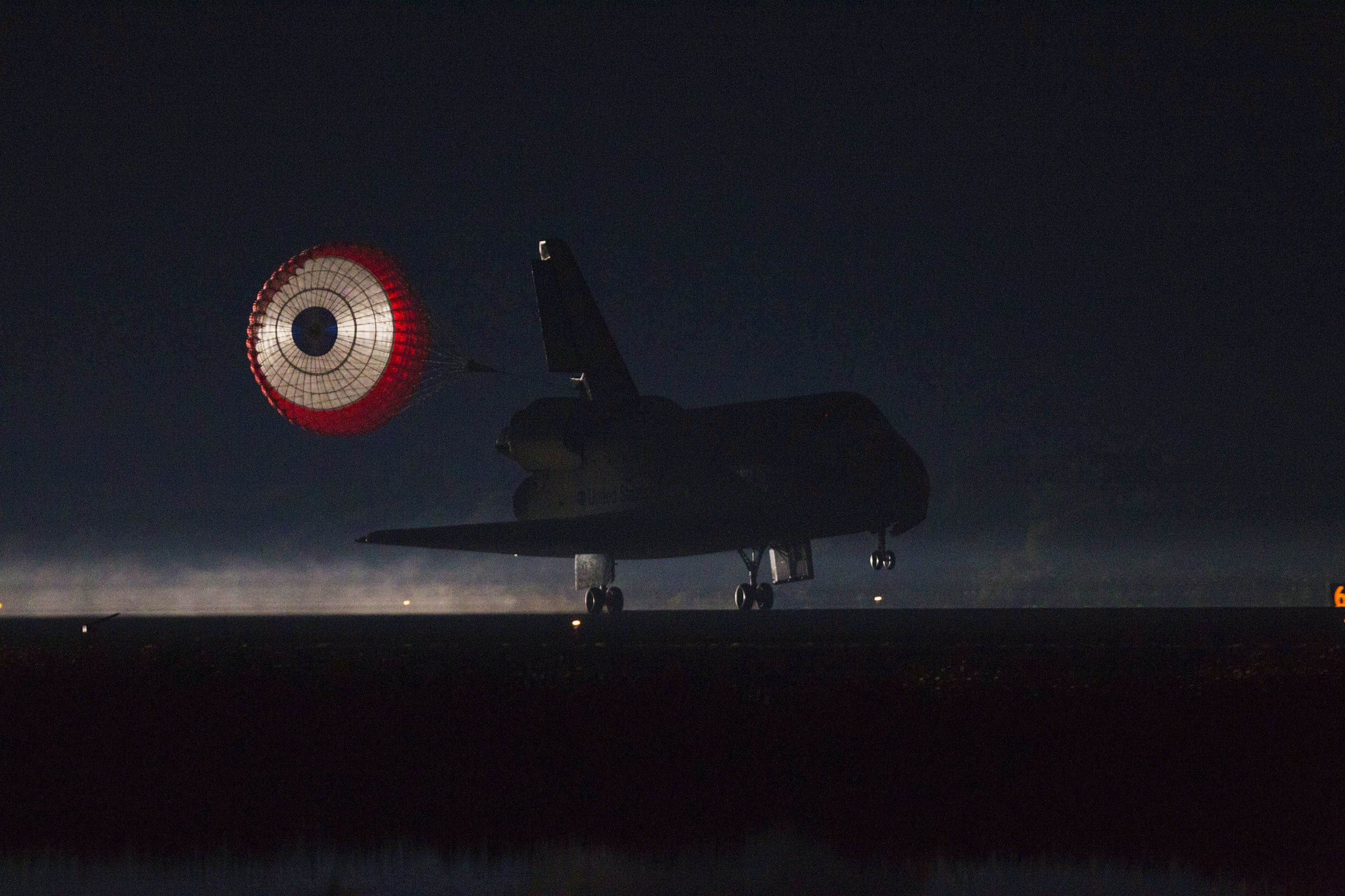 Space Shuttle Atlantis Lands with Drag Chute Deployed
