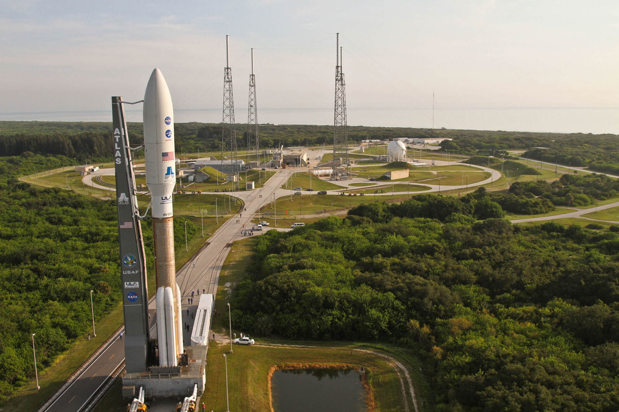 Atlas 5 Carrying Juno Spacecraft with Launch Complex 41 in Background 