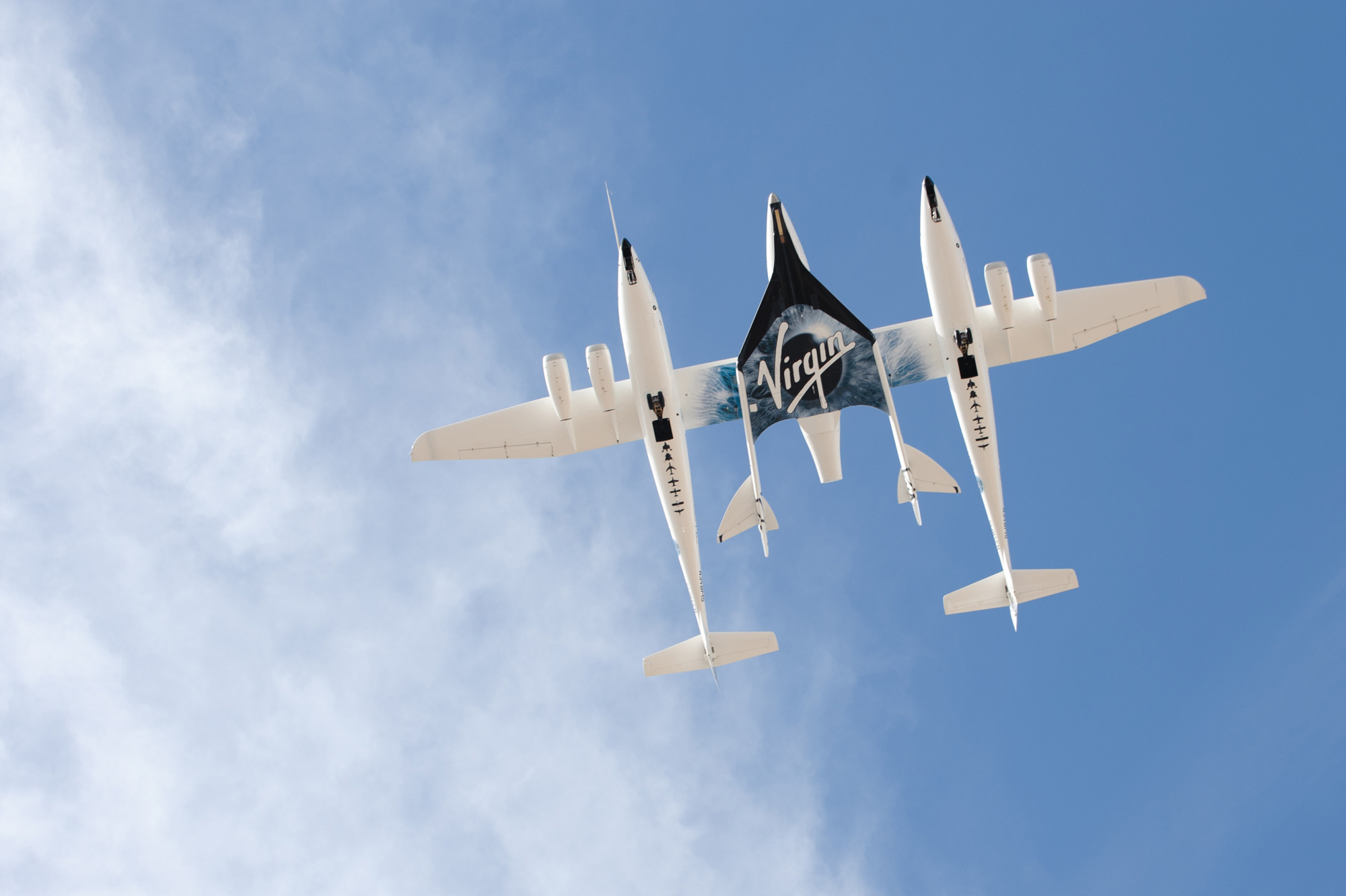 WhiteKnightTwo and VSS Enterprise Fly over the Spaceport