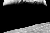 The Lunar Orbiter 1 spacecraft took the iconic photograph of Earth rising above the lunar surface in 1966.