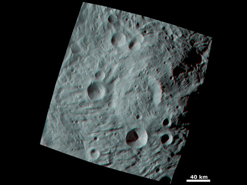 Vesta's Surface in 3D: A Big Mountain at the Asteroid's South Pole