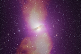 This radio, optical and gamma-ray composite illustrates the full extent of Cen A's vast radio-emitting lobes. Radio data (orange) reveal that the structures span more than 1.4 million light-years, and Fermi's LAT data (purple) show that they also emit gamma rays.