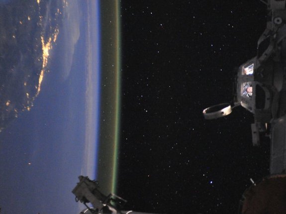 This picture shows astronaut Ron Garan on his last day at the International Space Station before returning to Earth in September 2011. He posted the picture on Twitter, writing "That's me in the cupola of the International Space Station off the coast of Australia taking my last of over 25,000 pics that I still want to share w/ everyone."