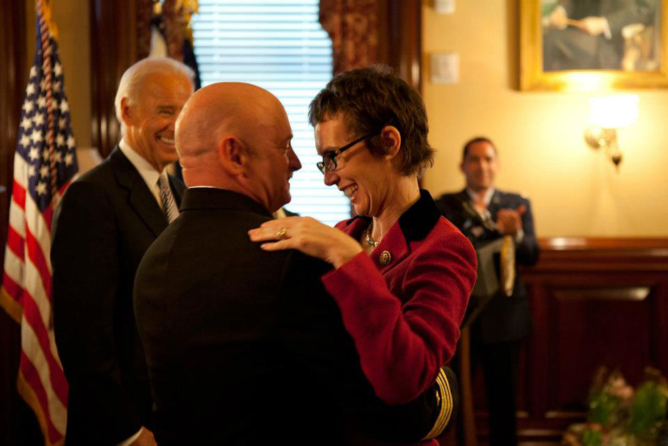 Kelly Hugs Giffords During Retirement Ceremony