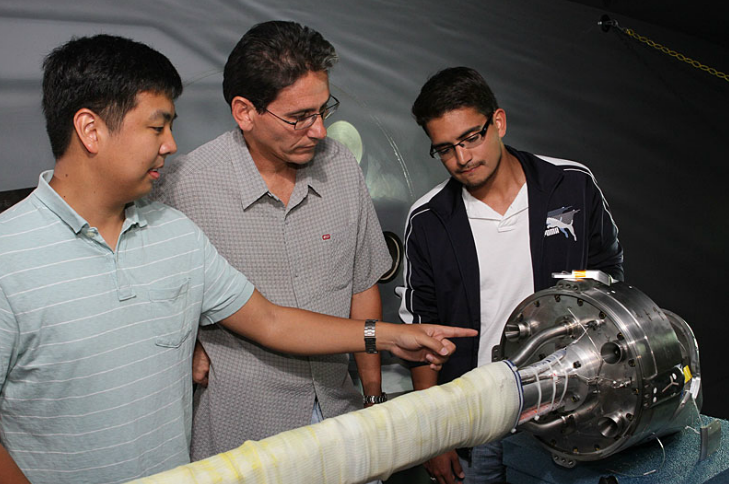 Boeing Engineers Look Over CST-100 Model