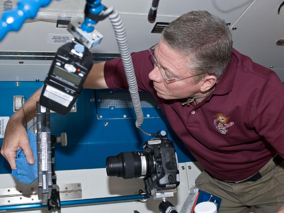 Expedition 29 Mike Fossum Conducting a Test