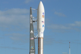 A closeup of NASA's Curiosity Rover and its Atlas 5 rocket as they sit on the launchpad on Nov. 25, 2011, a day before lifting off.