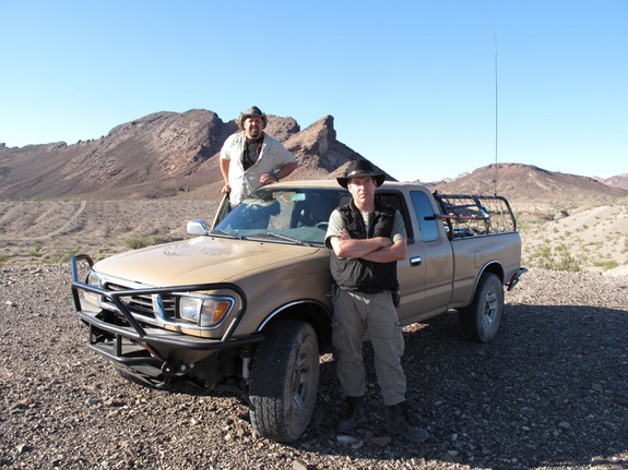 The stars of "Meteorite Men," Steve Arnold (left) and Geoff Notkin (right) are pictured with their truck, affectionately called "The Mule."