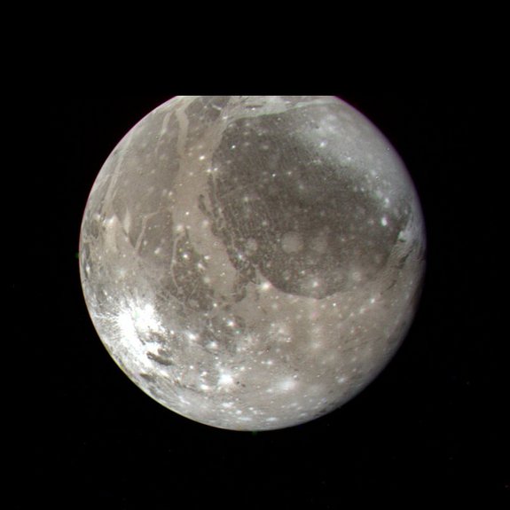 NASA's Voyager 2 spacecraft snapped this color image of Jupiter's moon Ganymede, the largest satellite in the solar system, on July 7, 1979 from a distance of 745,000 miles (1.2 million kilometers).