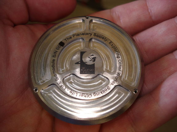 The Planetary Society's Phobos LIFE biomodule is carried within the Phobos-Grunt’s re-entry capsule. Shown here is a test model used to fabricate the final LIFE hardware.