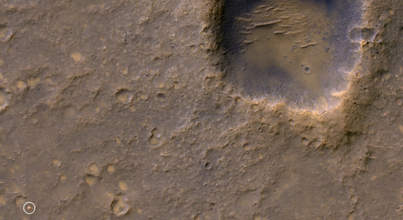 Near the lower left corner of this view is the three-petal lander platform (circled) that NASA's Mars Exploration Rover Spirit drove off in January 2004.