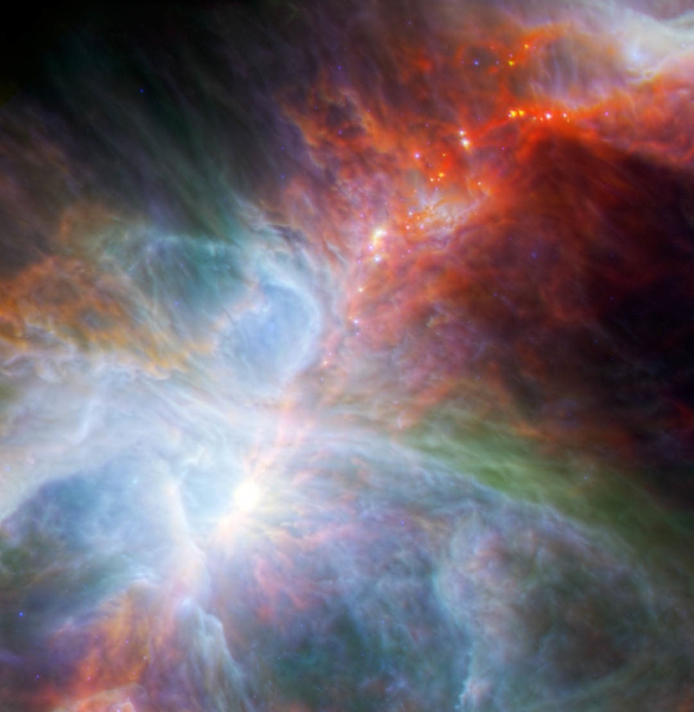 Orion Nebula Seen by Herschel and Spitzer